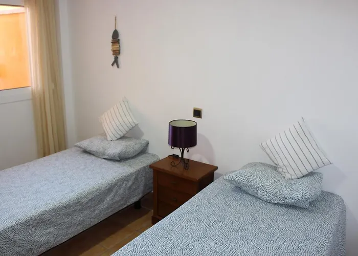 With A Serene Ocean And Mountain View