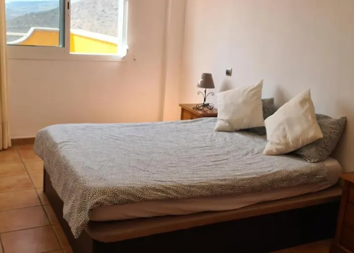 With A Serene Ocean And Mountain View Lägenhet