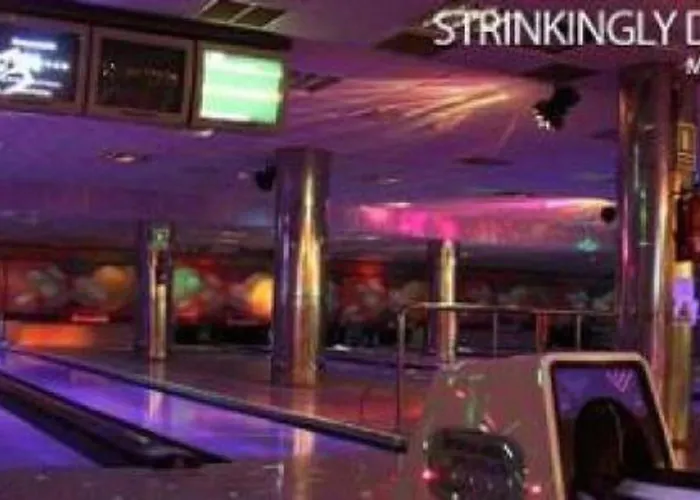 With A Serene Ocean And Mountain View