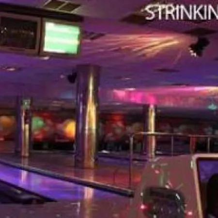 With A Serene Ocean And Mountain View