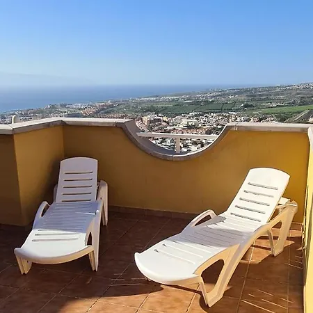 With A Serene Ocean And Mountain View Apartament